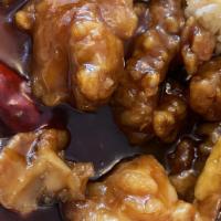 General Chicken · Chicken leg meat battered with corn starch 
deep-fried then cooked with sweet and spicy sauce.