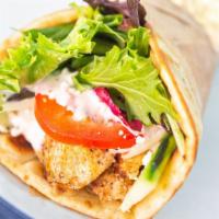 Garlic Chicken Breast Gyro 🐓 · Served in a toasted handmade pita with housemade tzatziki sauce, onion, organic mixed greens...