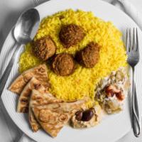 #6. Falafel Platter · Vegan served with rice or salad with hummus.