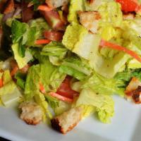 Caesar Salad · A classic Caesar! Shredded carrots and tomatoes tossed with romaine lettuce and topped with ...