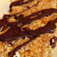 Peanut Butter Bar · Sweet chewy peanut butter bars with a dark chocolate drizzle (NUTS).