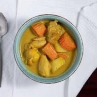 Yellow Curry Chicken · Yellow curry paste cooked with carrot, potato and coconut milk.