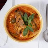 Red Curry Chicken · Red curry paste cooked with bamboo shoot, Thai eggplant, long bean, Thai basil, and coconut ...