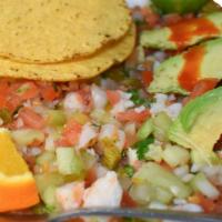 Ceviche De Camaron · Spicy level 2/5. Whole shrimp, avocado, onions, tomatoes, cucumber, chile curtido and saladi...
