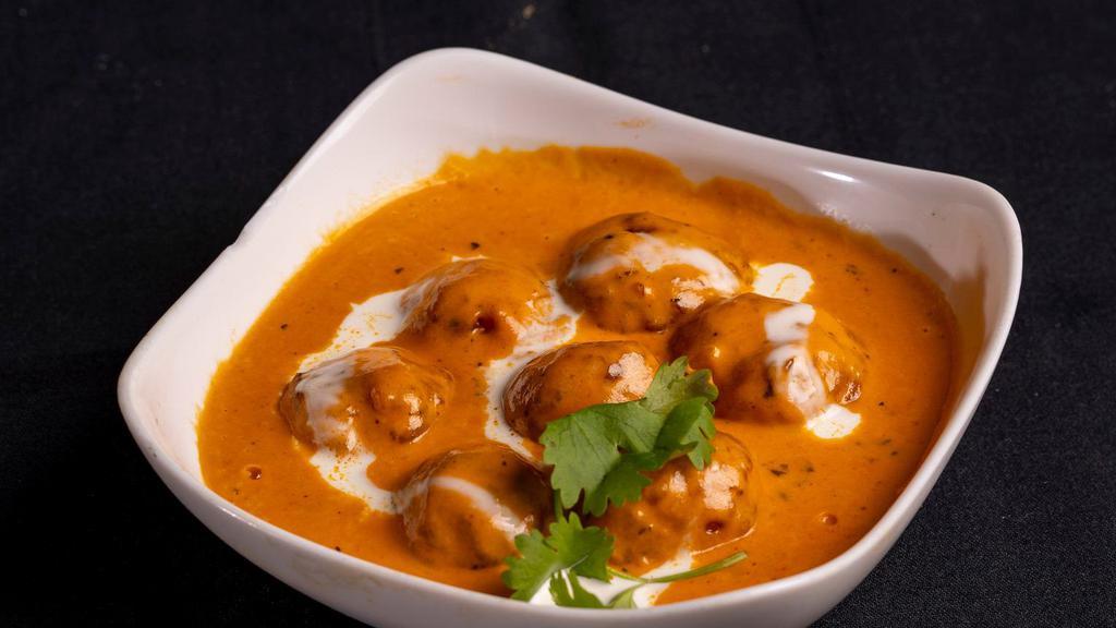Malai Kofta · Made with homemade cheese – nuts – minced vegetable balls in creamy sauce.