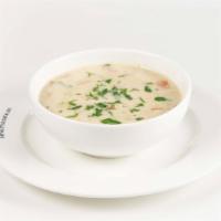 Earls Famous Clam Chowder · New England style, with full cream, chopped tomatoes, parsley, a hint of smoky bacon.