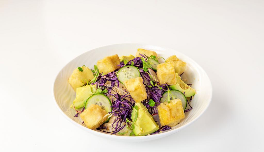 Crispy Tofu Zen Bowl · Jasmine rice, daikon, red cabbage, avocado, mushrooms, cucumber, snap peas, sesame salt.