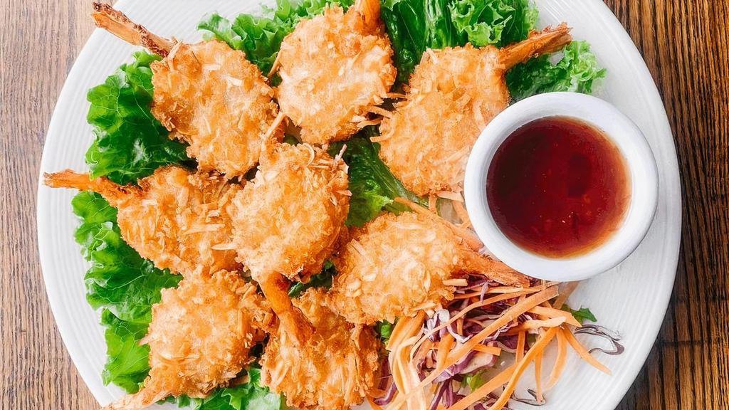 Coconut Prawns · Coconut battered prawns deep fried to golden brown, served with plum sauce.