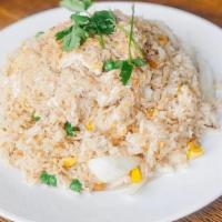 Crab Fried Rice · Stir-fried Jasmine rice with crab meat, egg, onion, carrots, peas, and corn; sprinkled with ...