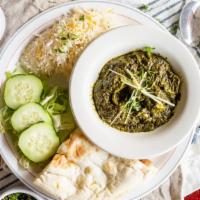 Palak · Fresh spinach cooked with cumin, ginger, turmeric, and all-spice.  (Gluten Free)