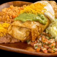 Chimichanga Combination Plate · Shredded beef or chicken burrito, deep fried and topped with guacamole, sour cream, cheese, ...