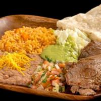 Carne Asada Combination Plate · Grilled steak topped with pico de gallo, guacamole, and lettuce. Comes with one flour tortil...