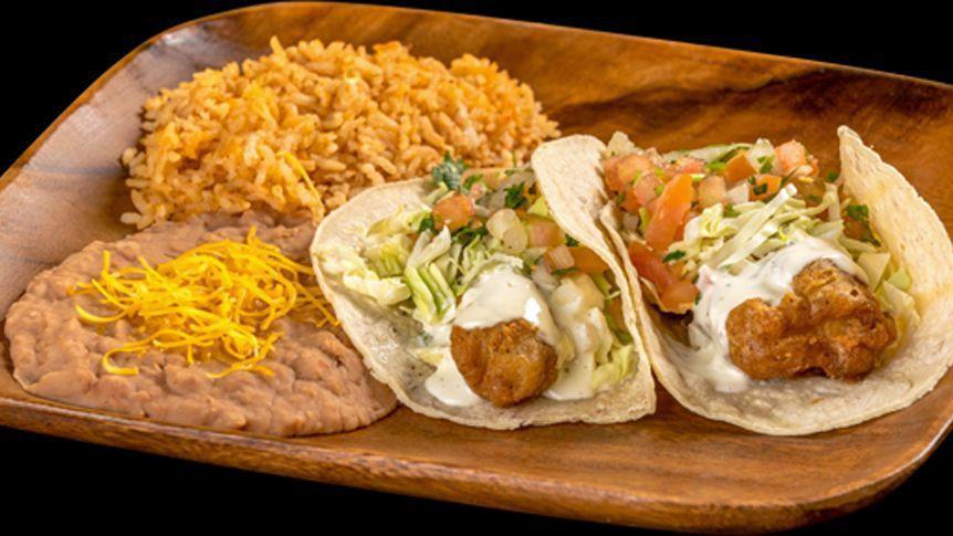 2 Fish Tacos Combination Plate · Two breaded fish tacos.