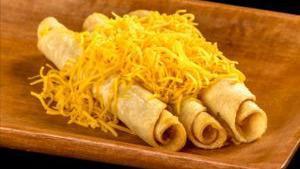 3 Rolled Tacos Cheese · Shredded beef rolled tacos topped with cheese.