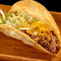 Beef Taco · Shredded beef, cheese, and lettuce.