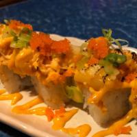 Ohana Roll · Tempura shrimp, krab topped with seared creamy scallops, spicy mayo, Shiracha, green onions ...