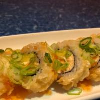 Alaska Roll · Salmon, avocado, cream cheese roll deep fried and topped with sweet chili sauce and green on...