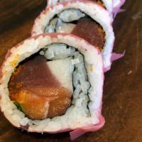 Bikini Roll · Salmon, Tuna, Yellowtail, avocado, green onions, masago wrapped in nori and then rolled in s...