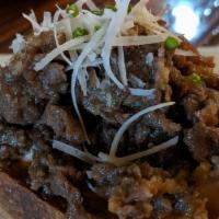 Bulgogi Pincho · Marinated slices of beef, soy sauce, parmesan cheese, garlic aioli, chive
