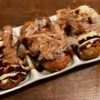 Takoyaki (6 Pieces) · Octopus dumplings, bonito flakes, mayo, tonkatsu sauce.
