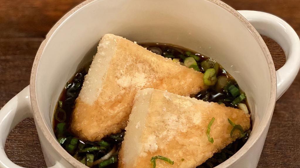 Agedashi Tofu · Fried tofu, green onions. in warm tempura broth.