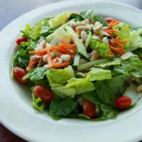 House Salad · Mixed greens, daikon, carrots, tomatoes, cucumber, peanuts. Served with creamy sesame dressi...
