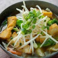 Tofu Vegetable Ramen · Vegetable broth. Fried or fresh tofu, bean sprouts, bok choy, broccoli, carrots, cabbage, sc...