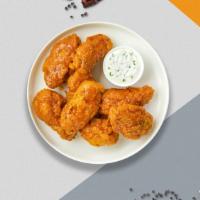 Charlie Mango Habanero Wings · Breaded or naked fresh chicken wings, fried until golden brown, and tossed in mango habanero...