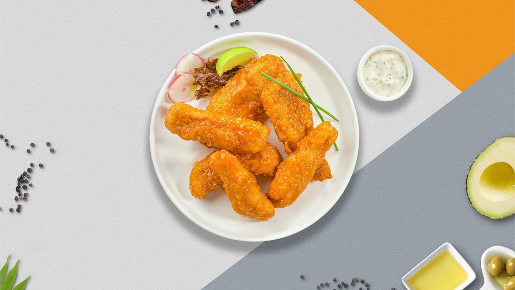 Baffling Buffalo Boneless Wings · Boneless breaded naked fresh chicken wings, fried until golden brown, and tossed in buffalo sauce. Served with a side of ranch or bleu cheese.