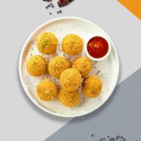 Bernie Mac & Cheese Bites · 10 Bite-size clumps of mac and cheese breaded and fried until golden brown. Served with your...