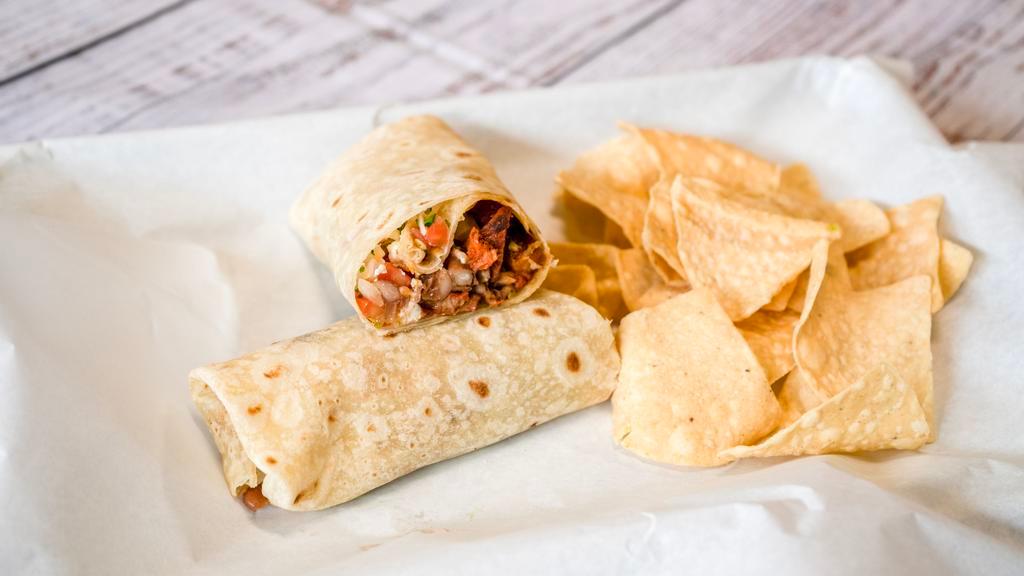 Burritos · Burritos served with side of chips choice of meat, whole beans, cheese, pico de gallo, avocado carne asada, adobada, or chicken.