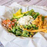 Frida Salad · Romaine lettuce, black beans, corn sweet peas, queso fresco pico de gallo, avocado, tortilla...