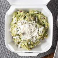Guacamole · Avocado mixed with roasted poblano pepper and red onion. Seasoned with salt, lime juice topp...