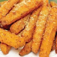 Fried Zucchini Sticks · Our Fried Zucchini Sticks are lightly breaded and fried to golden brown perfection and serve...
