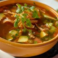 Grilled Chicken Tortilla Soup · Cilantro, onions, tomatoes, cheese, avocado.