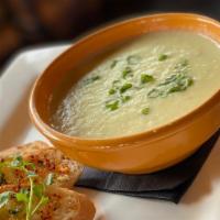 Spicy Cauliflower Bisque · Poblano peppers, crostini, pepper jack cheese.