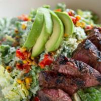 Flat Iron Steak Salads · Romaine hearts, avocado, roasted red peppers, cilantro-lime cream dressing, roasted corn, pu...