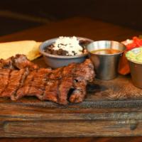 Grilled Cab Skirt Steak Carne Asada · Refried beans, escabeche, cascabel salsa, guacamole, warm tortillas. 

Consuming raw or unde...