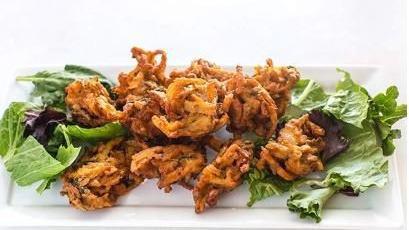 Vegetable Pakoras · Assortment of vegetables marinated in gram flour and spice, fried to perfection.