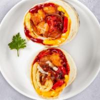 Spicy Morning Burrito · Eggs, spicy jalapenos, hot sauce, cheddar cheese, onions, tomatoes wrapped in a flour tortil...