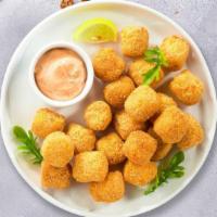 Morning Tots · (Vegetarian) Shredded Idaho potatoes formed into tots, battered, and fried until golden brown.