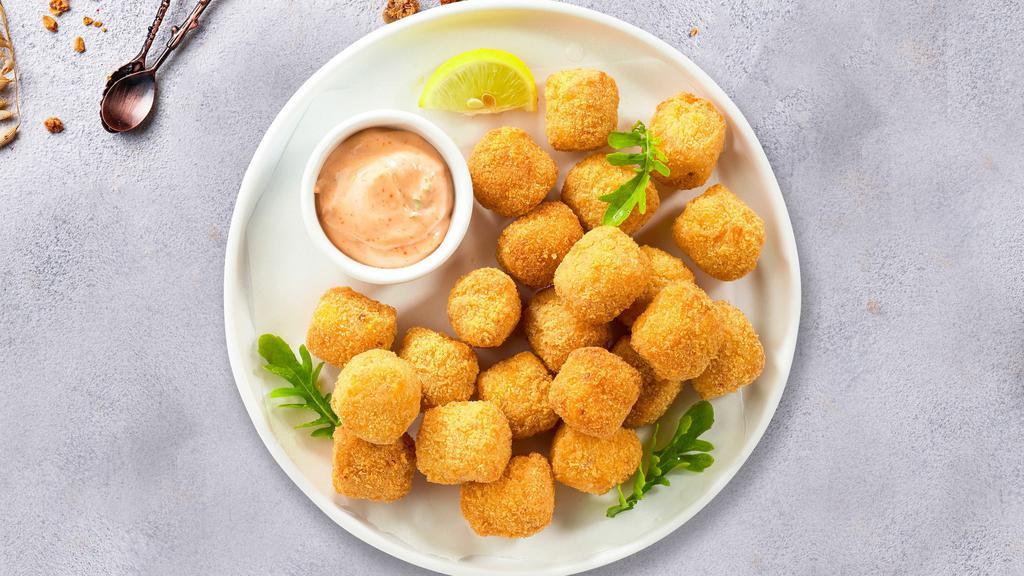 Morning Tots · (Vegetarian) Shredded Idaho potatoes formed into tots, battered, and fried until golden brown.
