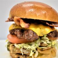Red Wagon Burger   
 · 1/3LB ANGUS CHUCK GROUND BEEF PATTIES - SERVED ON GRILLED BRIOCHE BUN, GRILLED MUSHROOM, GRI...