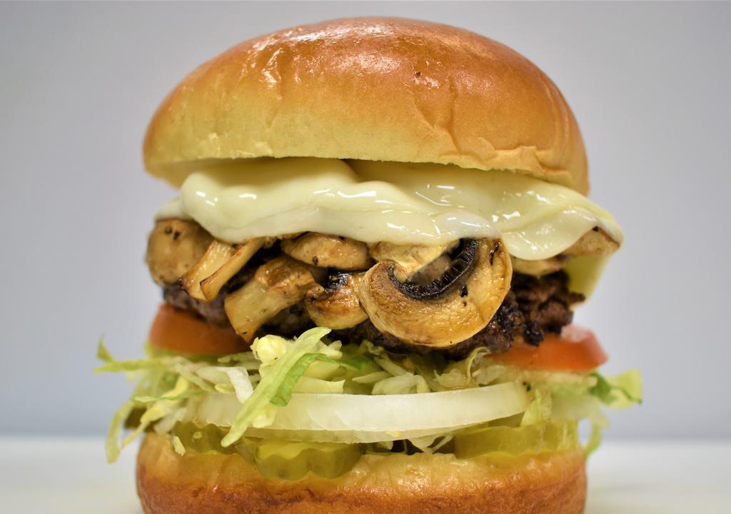 Mushroom  Burger    · 1/3LB ANGUS CHUCK GROUND BEEF PATTIES - SERVED ON GRILLED BRIOCHE BUN, GRILLED MUSHROOM,PROVOLONE CHEESE ,LETTUCE, 
TOMATOES, PICKLE, ONIONS, AND HOUSE SAUCE