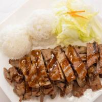 Pork Teriyaki · Comes with steamed rice and salad.