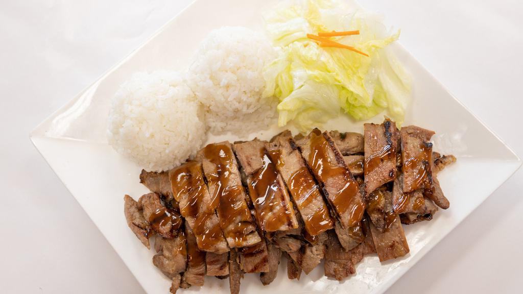 Pork Teriyaki · Comes with steamed rice and salad.