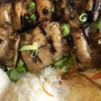 Grilled Chicken & Rice · Deluxe grilled chicken, served with steamed rice, an over-medium egg**, and healthy servings...