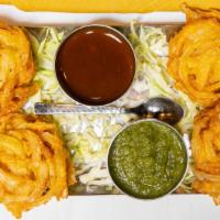 Onion Bhaji · onions slices drenched in a chickpea batter, fried
