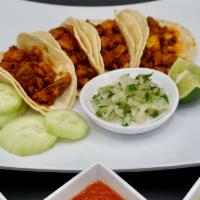 Taquiza · Four Street Style Tacos Served with your choice of Meat (Asada, Carnitas, Chicken, or Pastor...