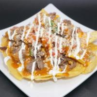 Mexican Nachos · Served with your choice of Meat (Asada, Carnitas, Chicken, or Pastor), Beans, Pico de Gallo,...